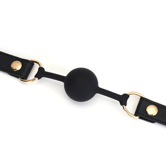 Liebe Seele - Dark Secret - Exclusieve Siliconen ball gag met lederen riempjes - zwart/goud