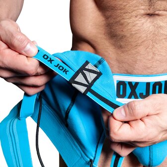 Oxjok Slingjock - Upthrust Slider Jockstrap - Ingebouwde Cockring - Met opbergvakje - Pool Blue - Maat L