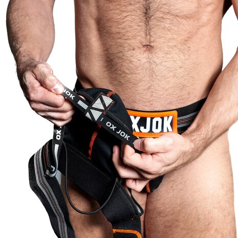 Oxjok Slingjock - Upthrust Slider Jockstrap - Ingebouwde Cockring - Met opbergvakje - Black Iron - Maat XL