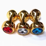 anaaldildo goudkleurig metaal witte steen small