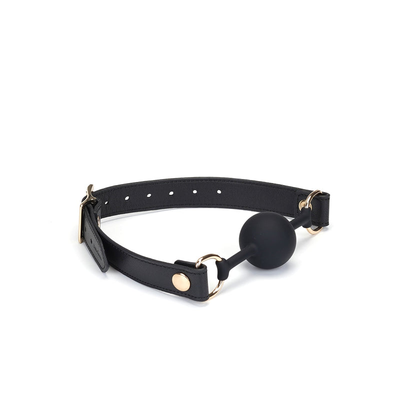Liebe Seele - Dark Secret - Exclusieve Siliconen Ball Gag Met Lederen Riempjes - Zwart/Goud
