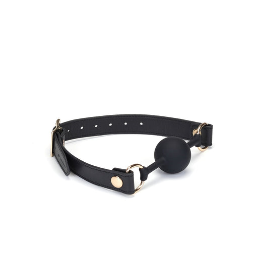 Liebe Seele - Dark Secret - Exclusieve Siliconen Ball Gag Met Lederen Riempjes - Zwart/Goud