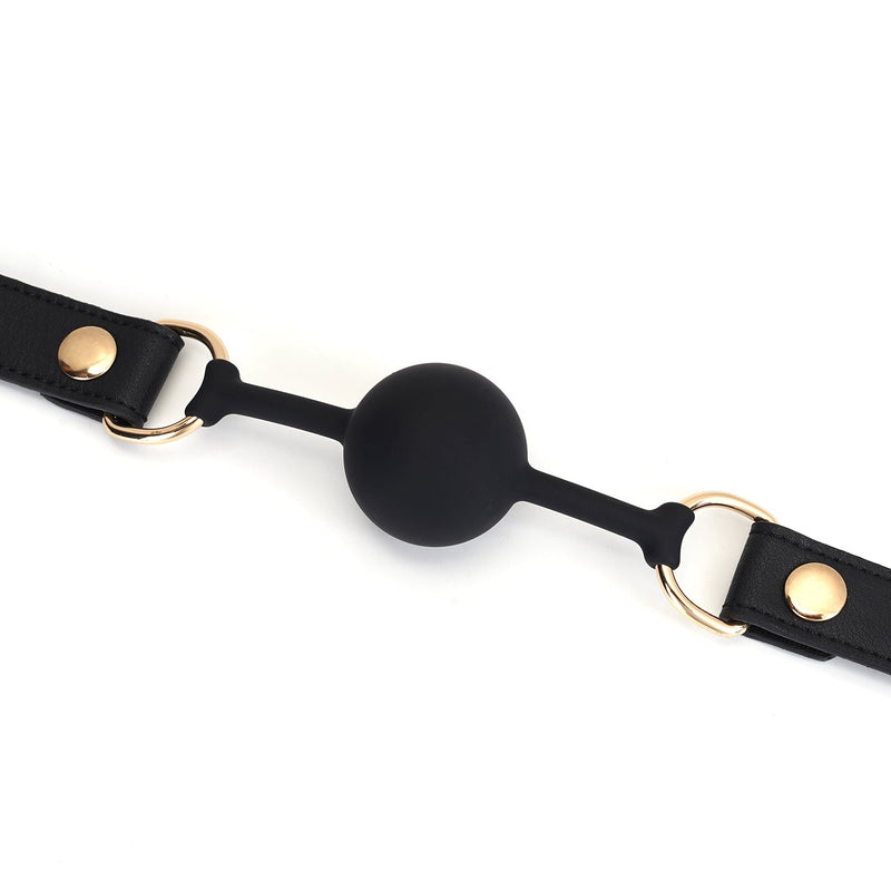 Liebe Seele - Dark Secret - Exclusieve Siliconen Ball Gag Met Lederen Riempjes - Zwart/Goud