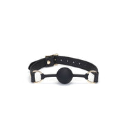 Liebe Seele - Dark Secret - Exclusieve Siliconen Ball Gag Met Lederen Riempjes - Zwart/Goud