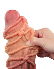 LoveToy - XXL Extreme Dildo met Touw Motief - Lengte 24 cm - Bruin/Lichte Huidskleur